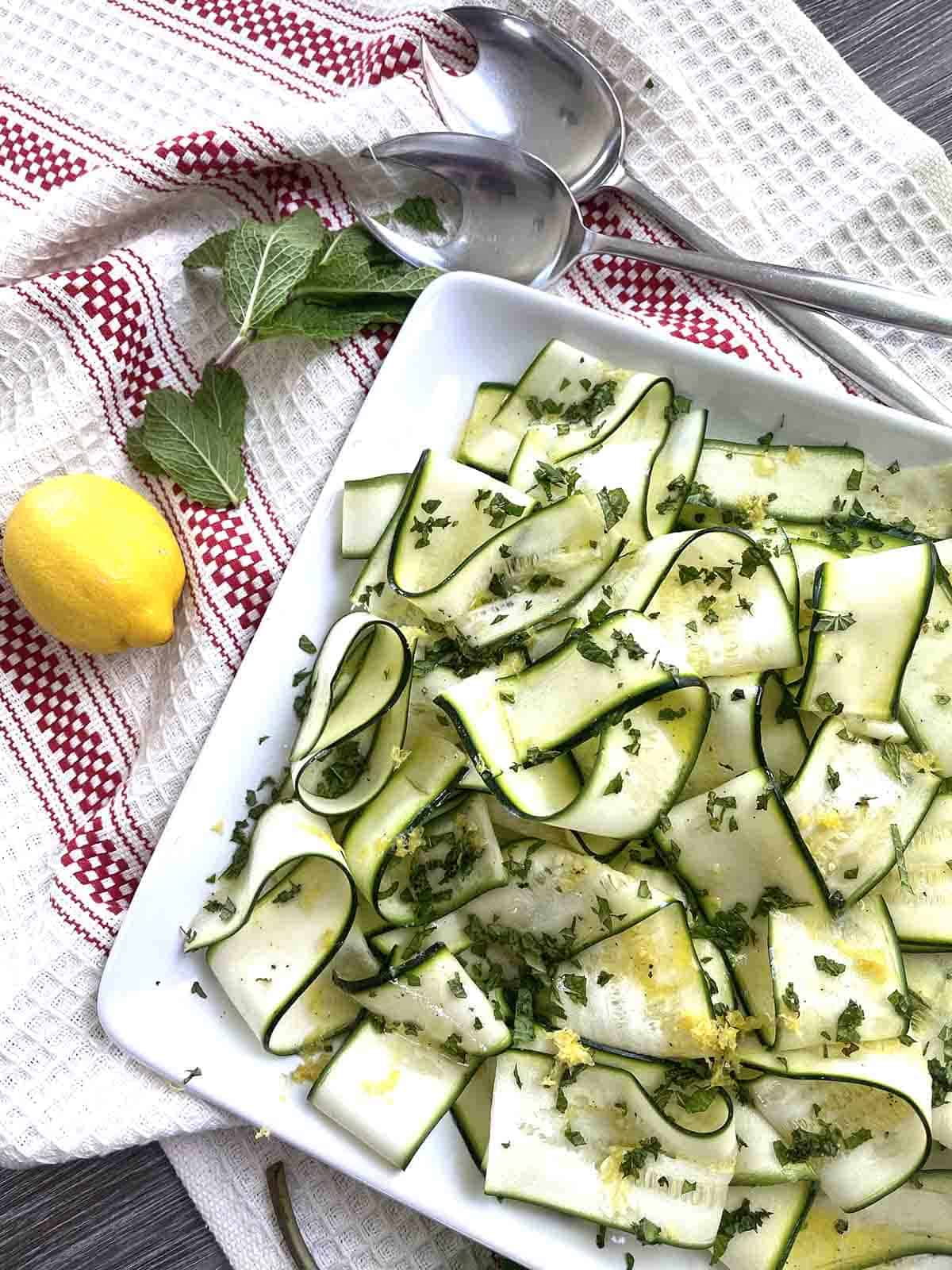 close up of raw zucchini salad or courgette ribbon salad.