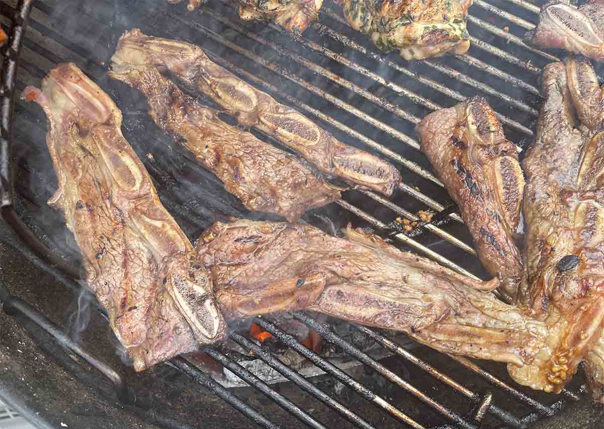 flanken style beef short ribs on a barbecue.