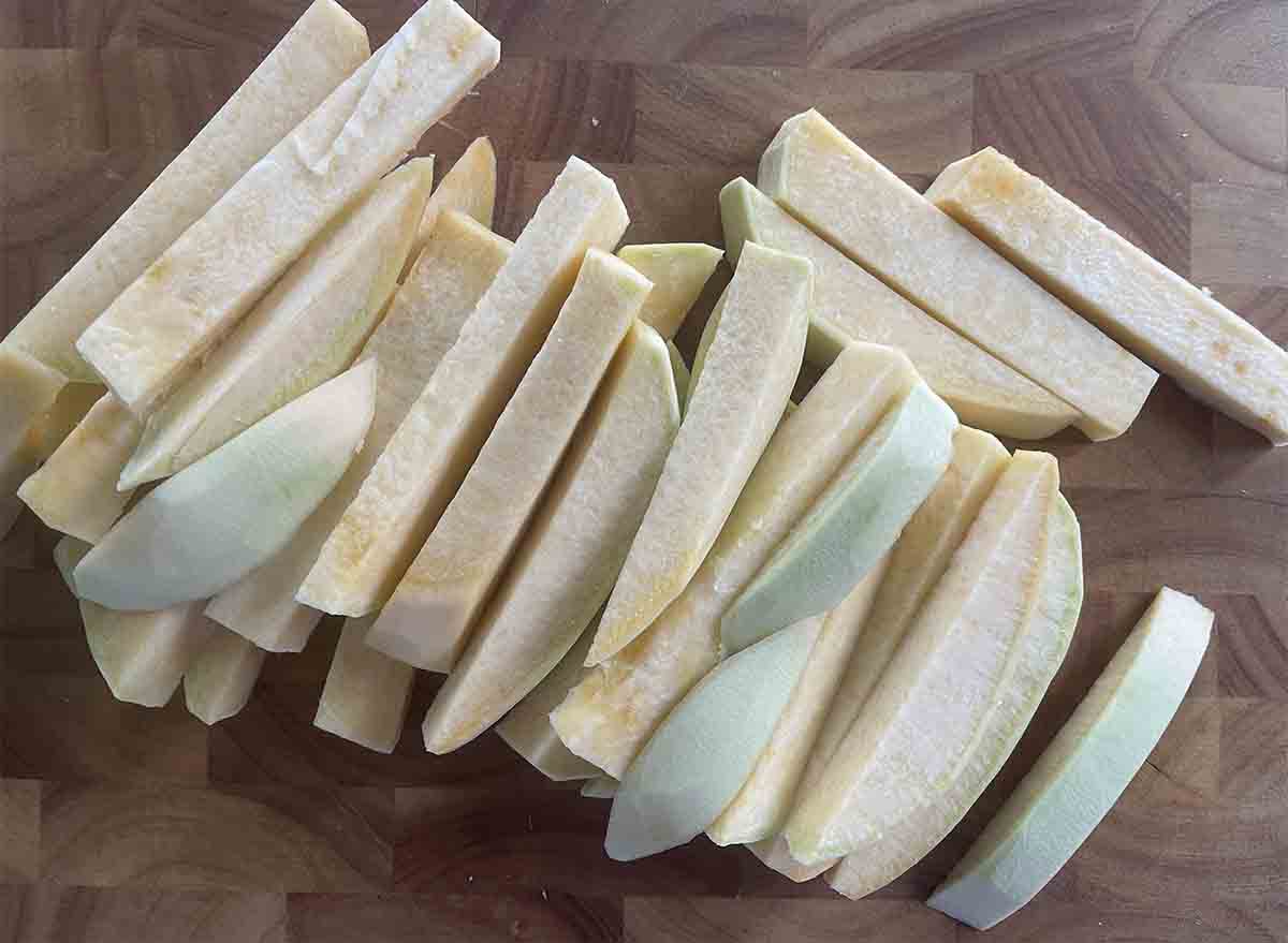 chopped swede on a board.
