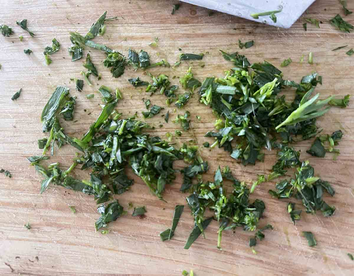 chopped tarragon on aboard.