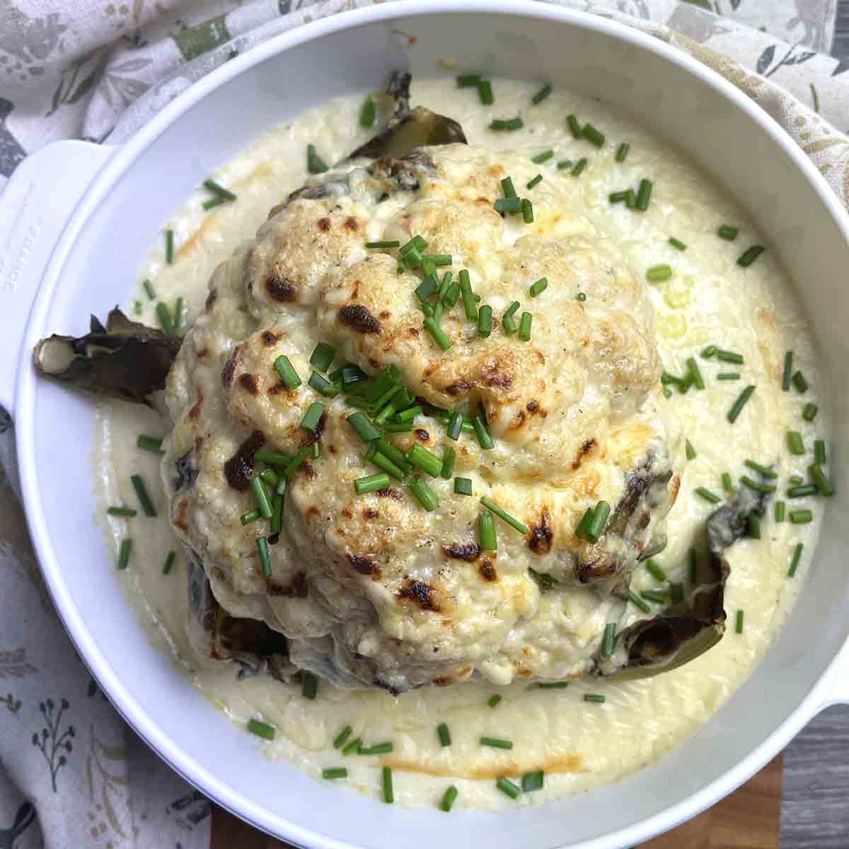whole baked cauliflower cheese.
