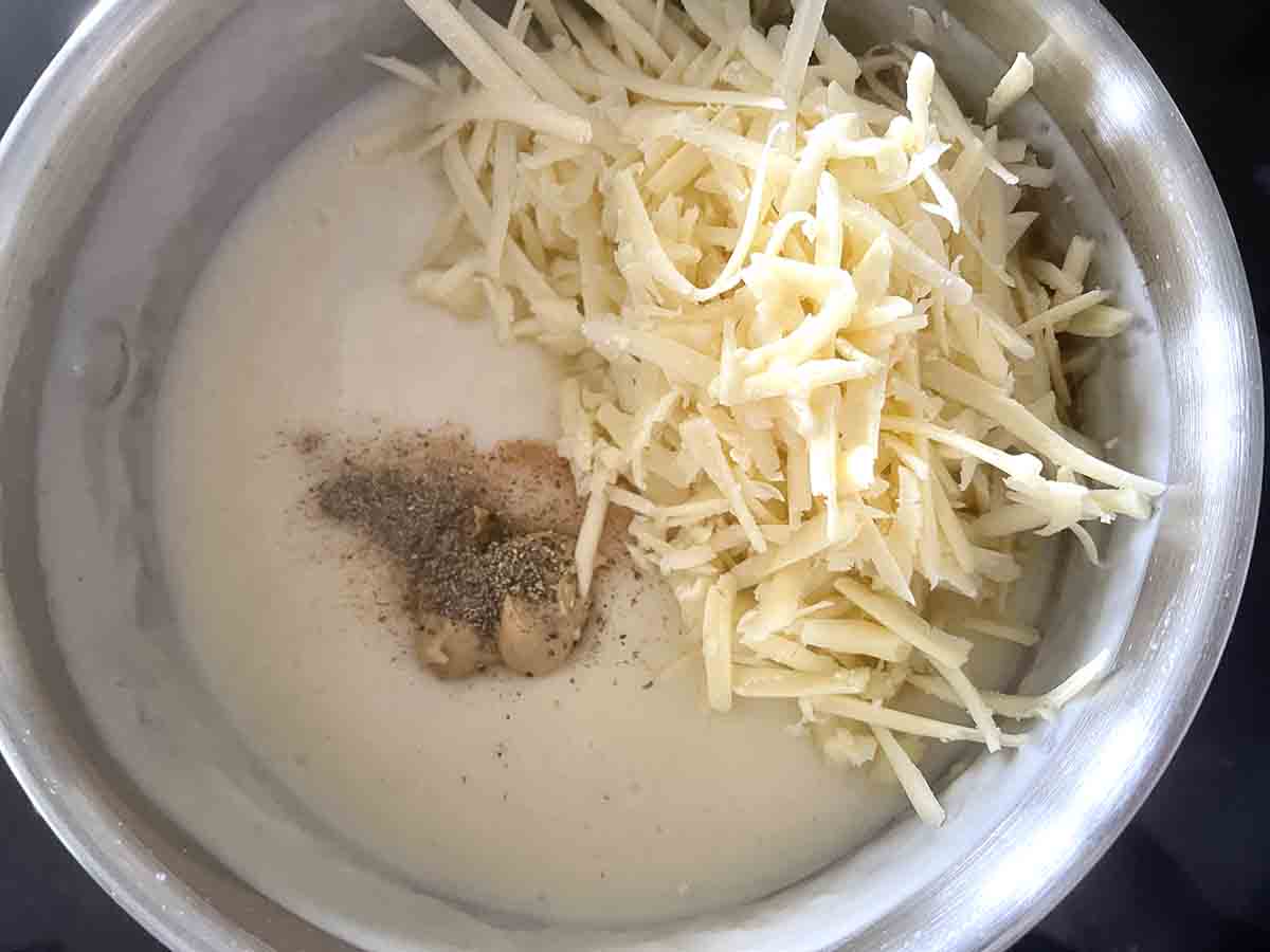 cheese added to sauce.