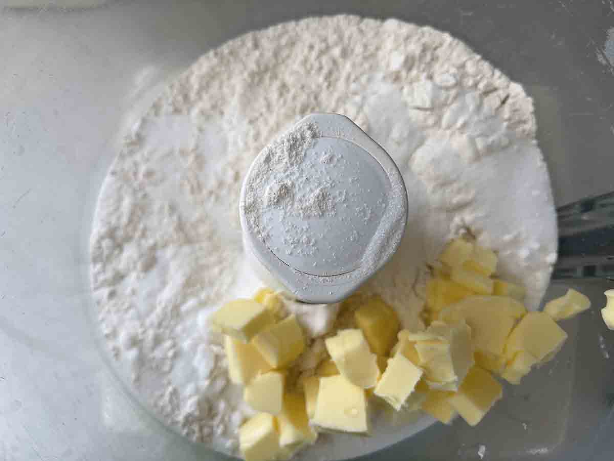 sugar, flour, salt and butter in a food processor bowl.