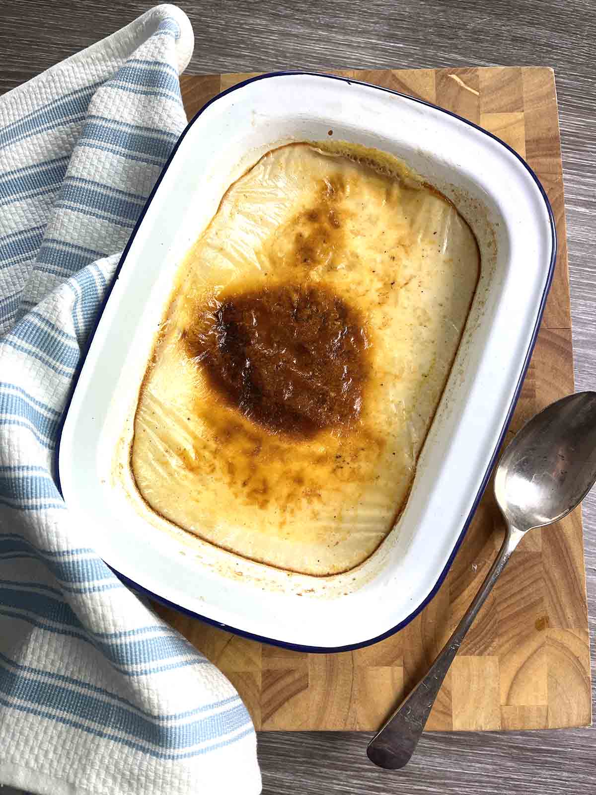 creamed rice pudding in enamel dish.