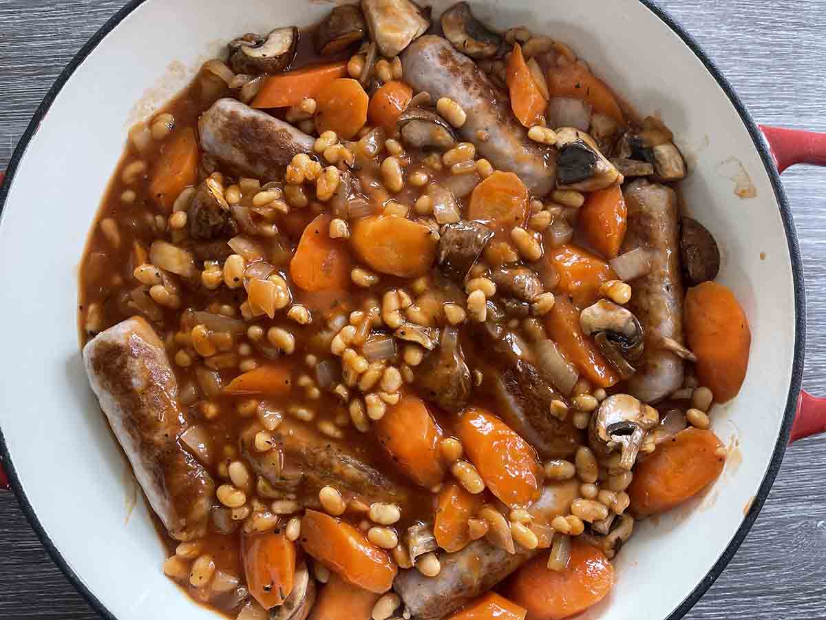 sausages added to pan.