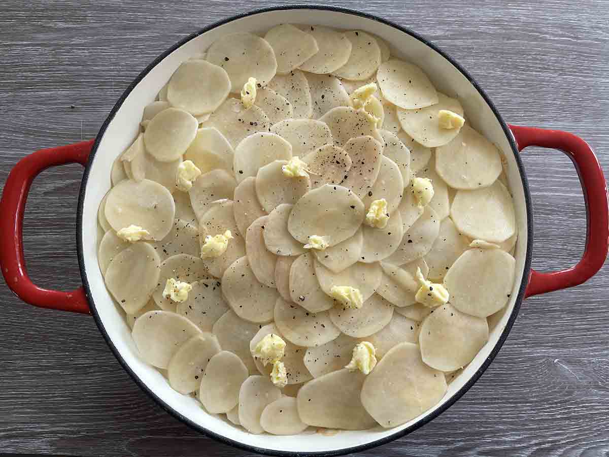 potatoe slices added to sausages.