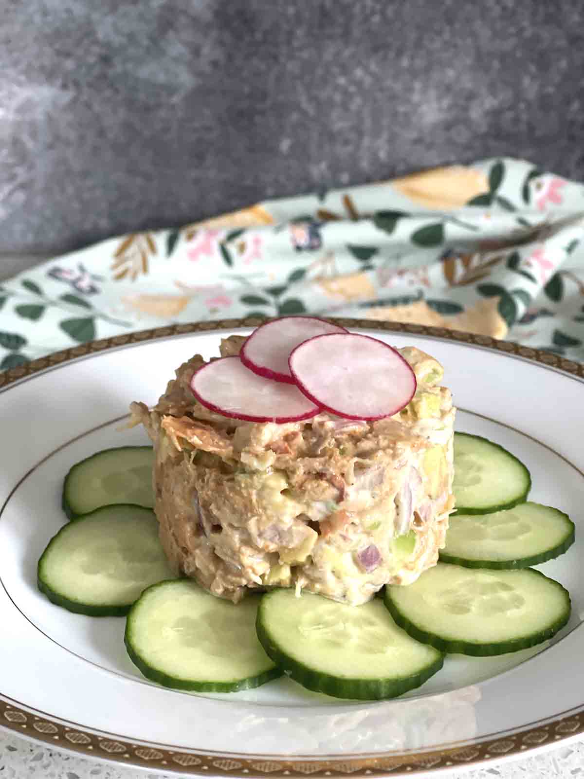 spicy crab salad on a bed of cucumber.