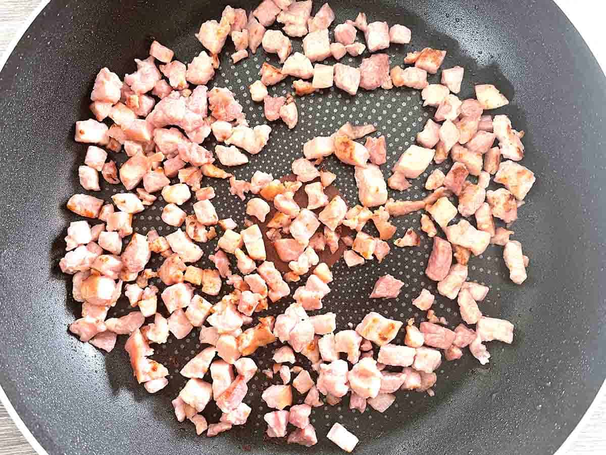 fried bacon in a pan.