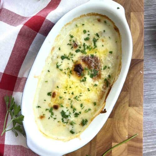 fish mornay in a dish.