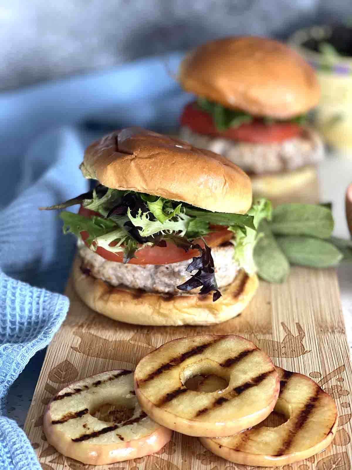 pork and apple burger  in a bun.