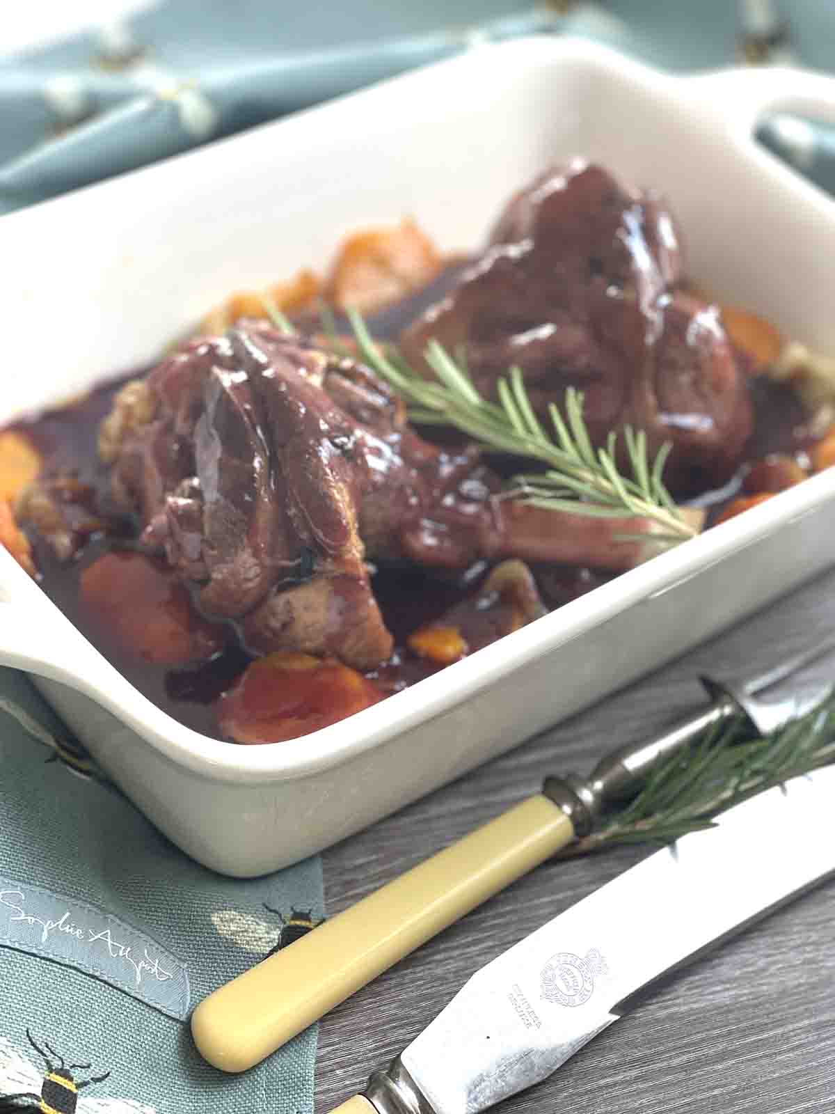 lamb shanks in a serving dish.