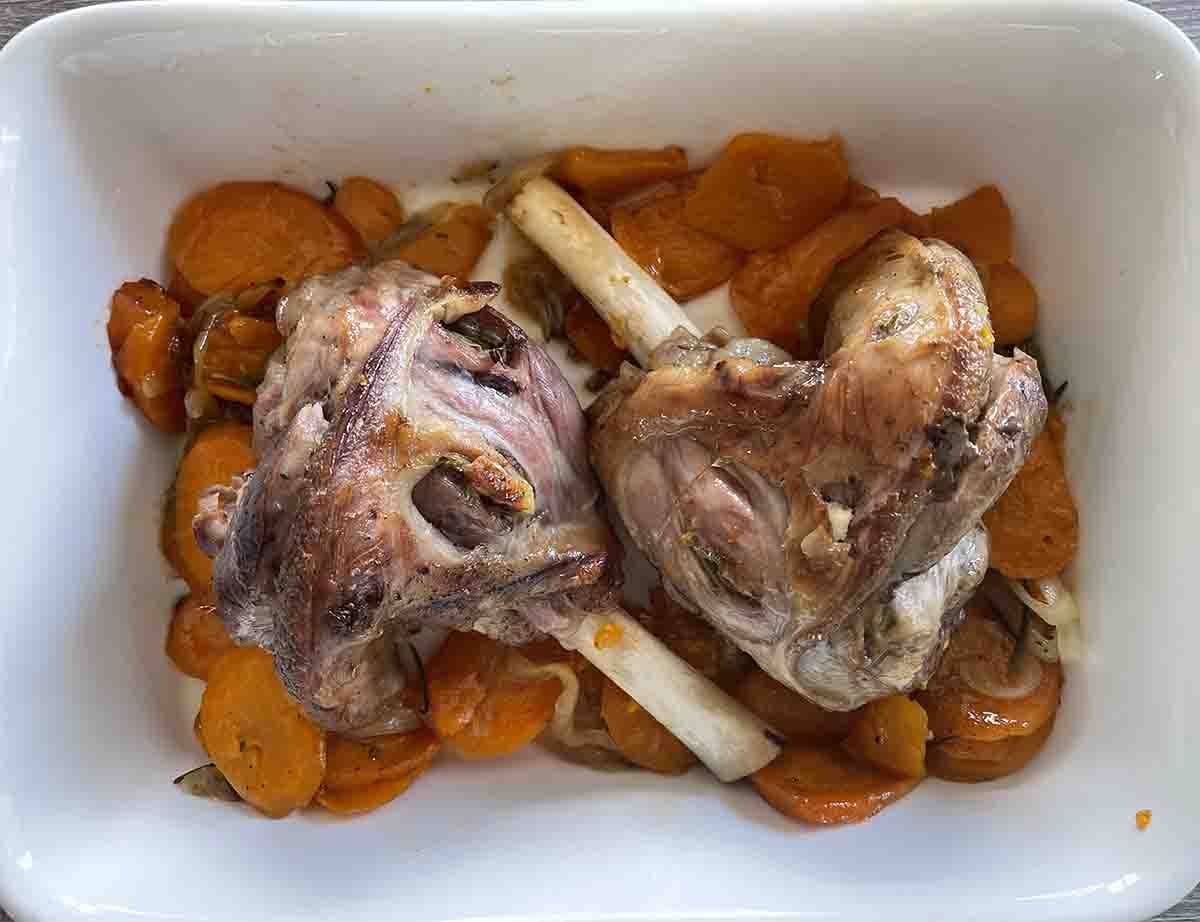 lamb shanks in a serving dish.