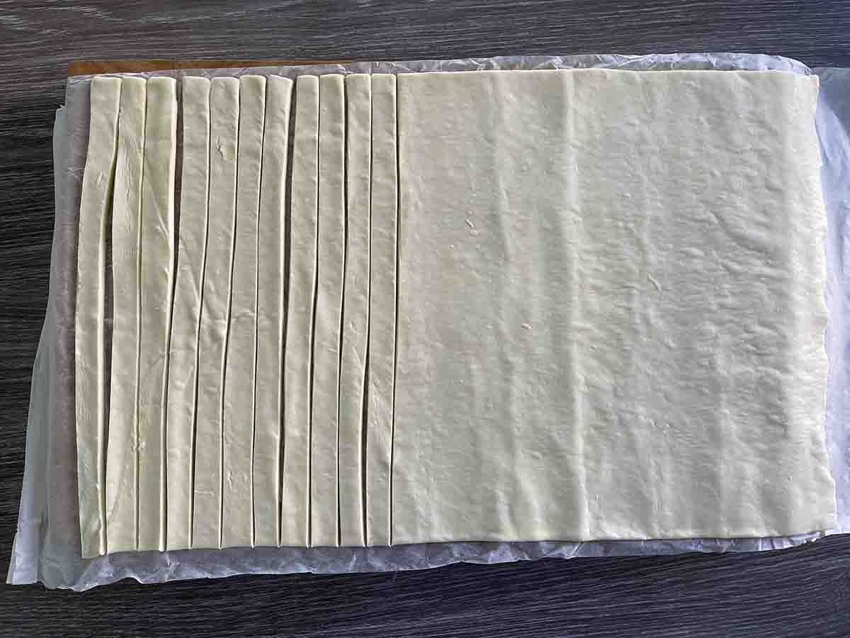 puff pastry sheet with strips but from the short edge.