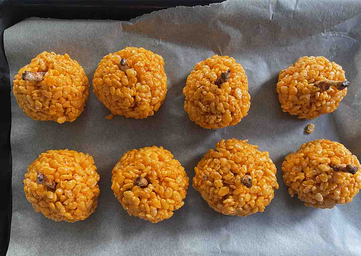 halloween rice crispie treats on parchment.