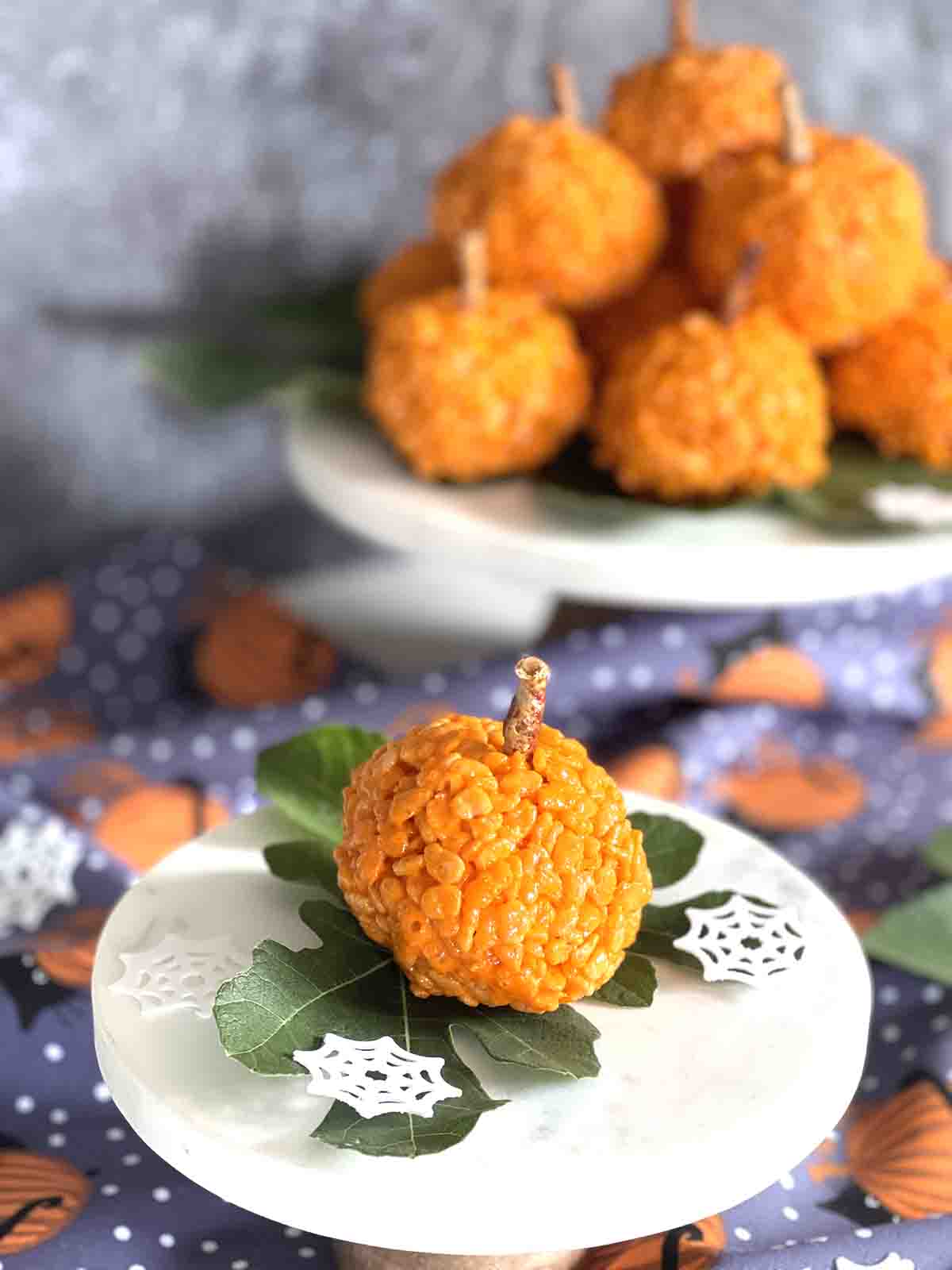 Halloween rice krispie treats on a plate.
