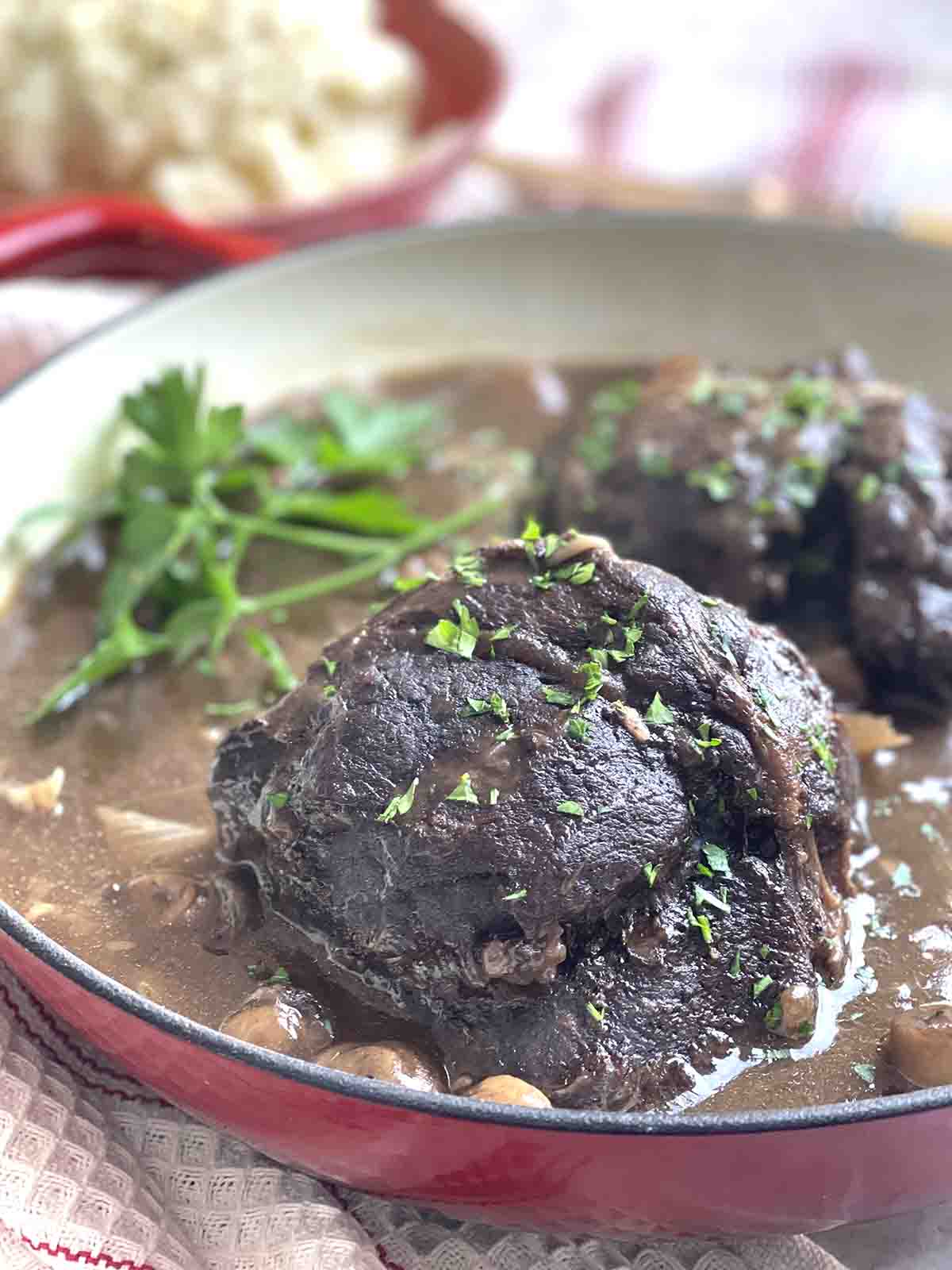 close up of braised ox cheek in red wine.