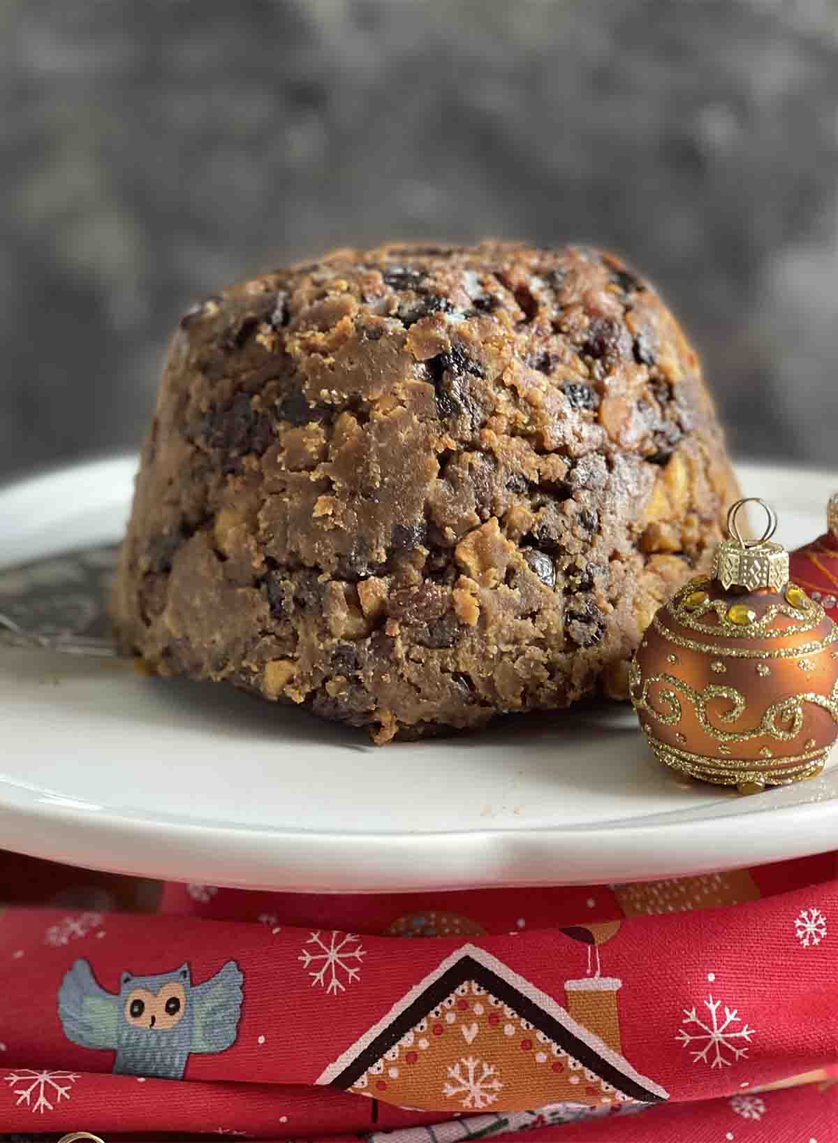 Slow cooker Christmas pudding on a plate.