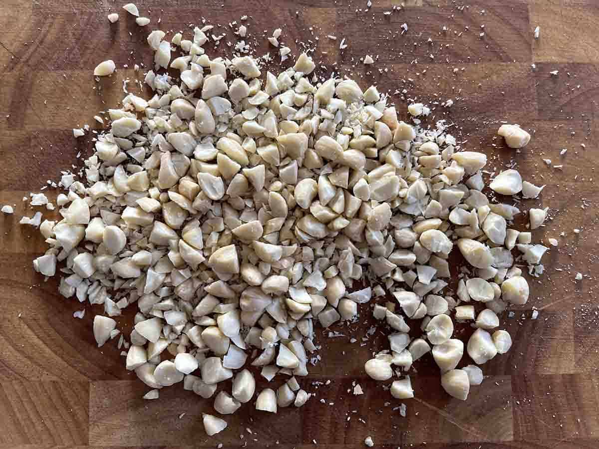 chopped almonds on a board.