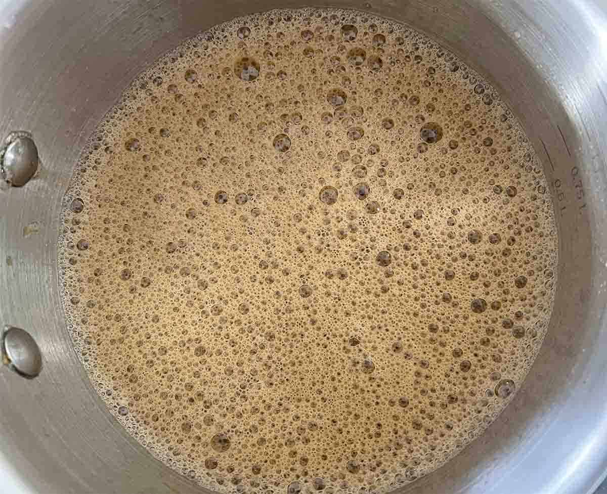stout, orange and treacle in a saucepan.