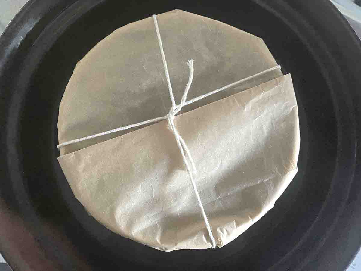 basin wrapped with parchment.