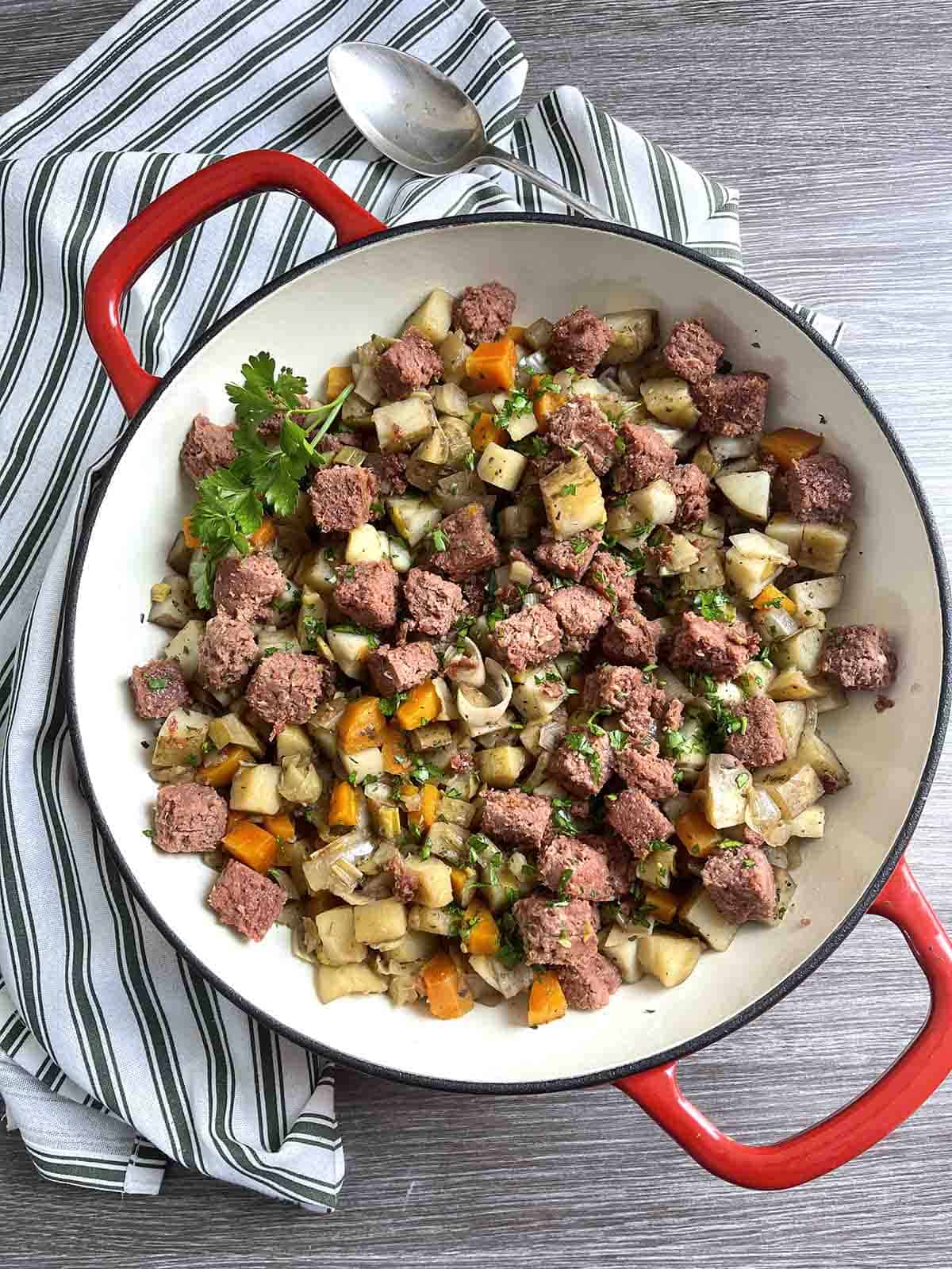 slow cooker corned beef hash in a dish.
