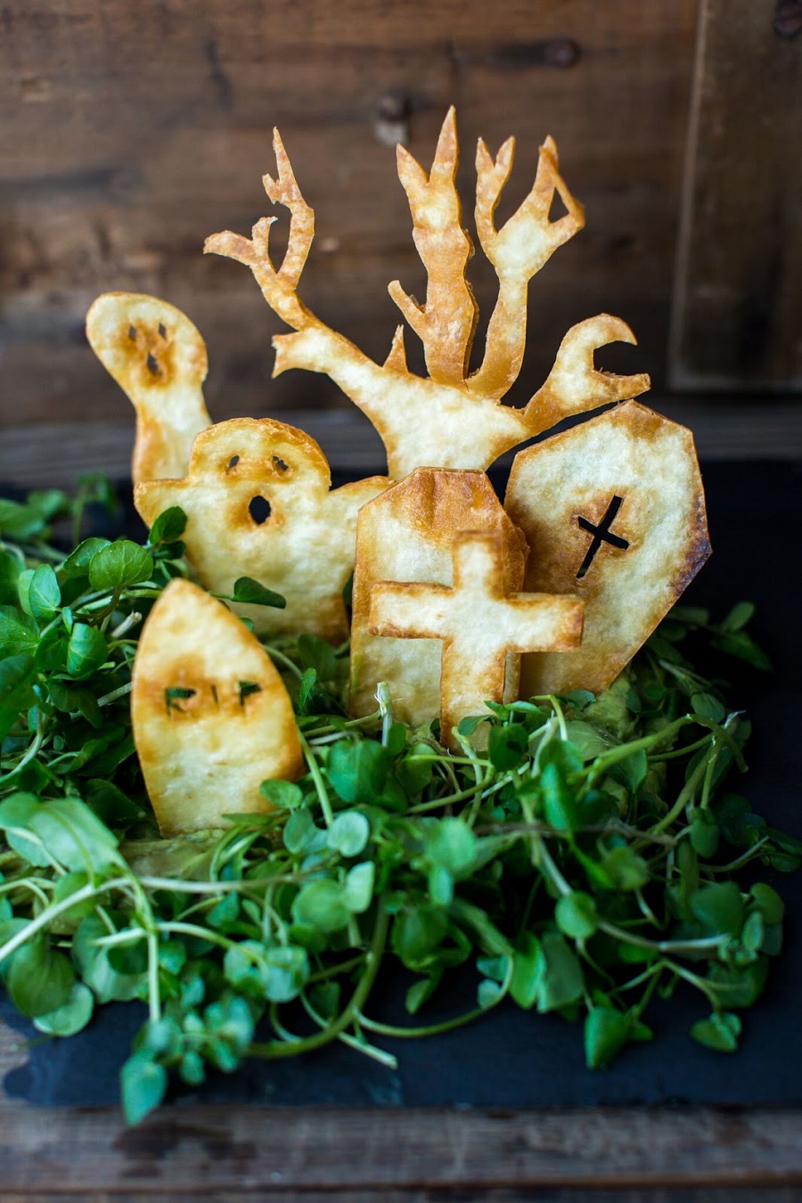 Spooky Tortilla Graveyard With Guacamole Dip. 