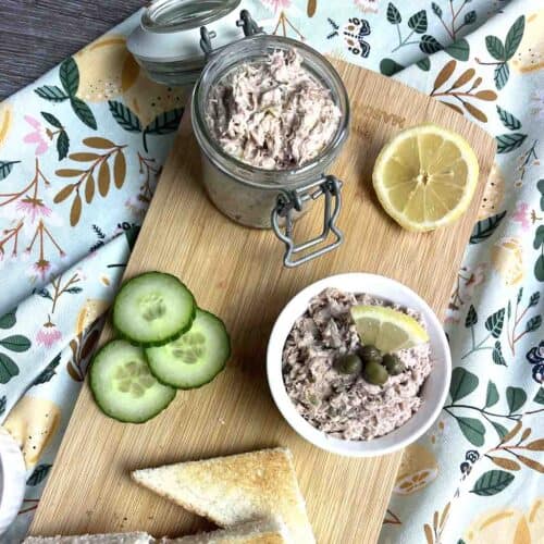 tuna pâté in a pot on a board.