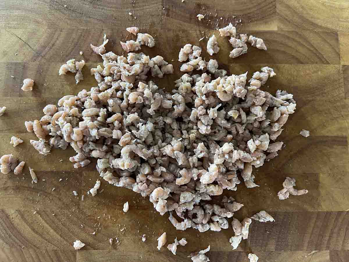 chopped shrimps on a board.