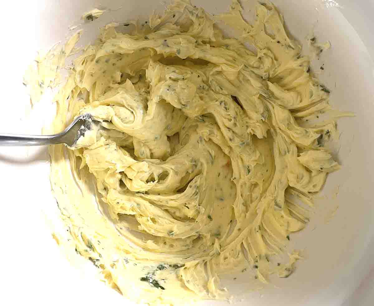 roasted garlic butter for steak in a bowl.
