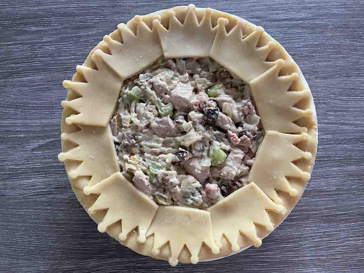 crown pastry in a ring around pie.