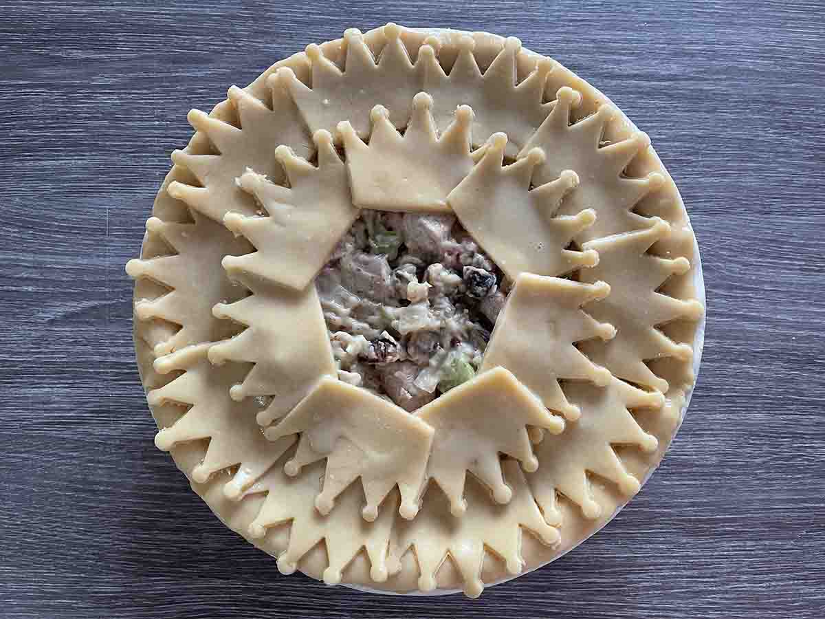 crown pastry in a ring around pie.