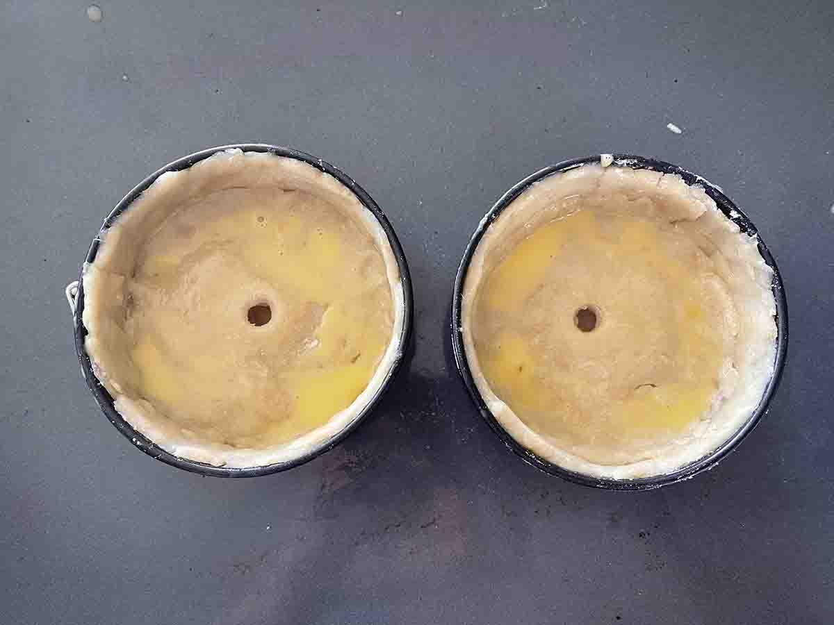 lamb mince pies glazed for the oven.