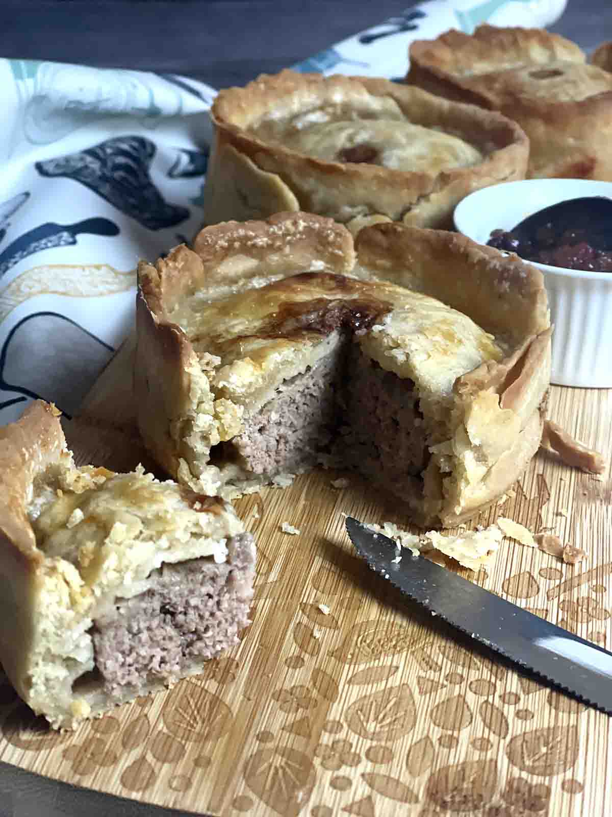 lamb pie with piece cut.