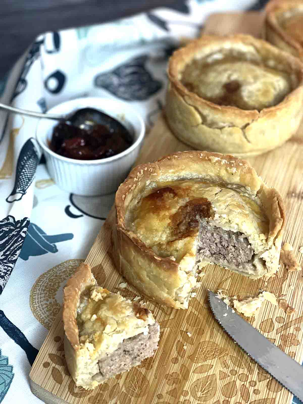 lamb pie with piece cut.