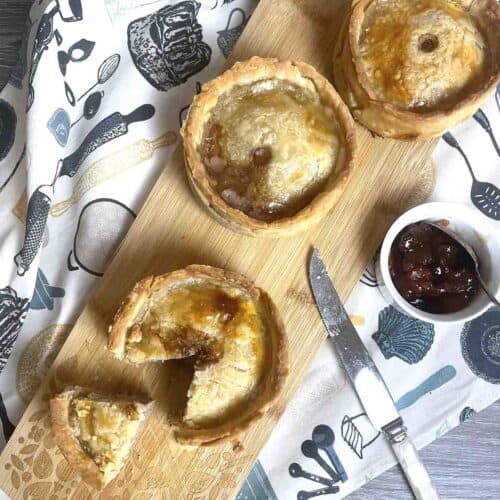 scotch pies on a board.