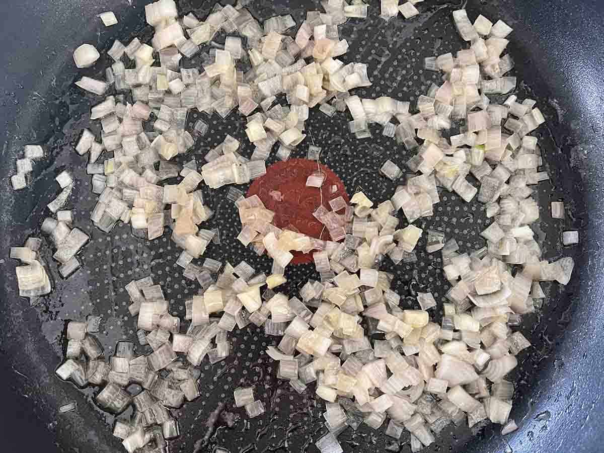 whiskey added to shallots.