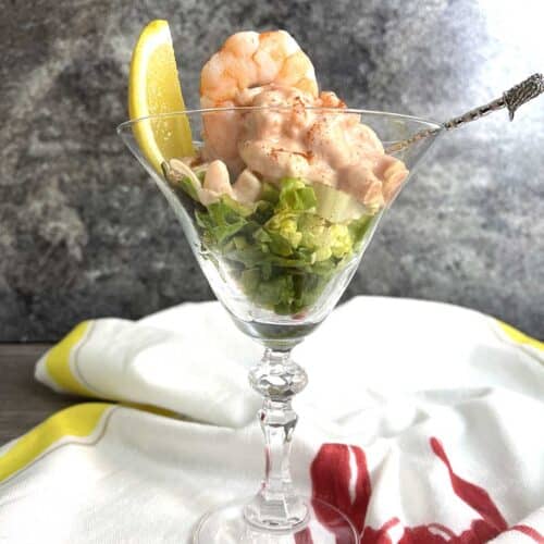 prawn cocktail with avocado in a glass.