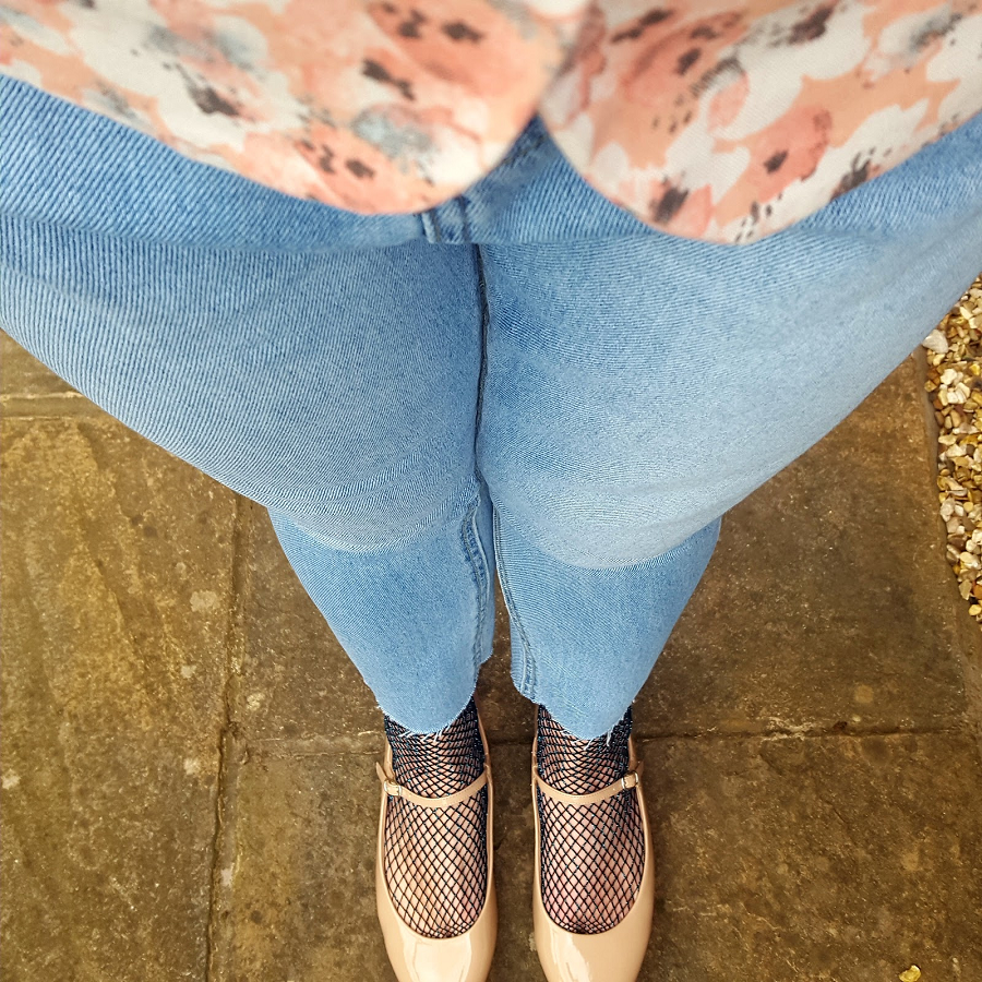 Elevating Your Style with Jeans and Fishnet Socks