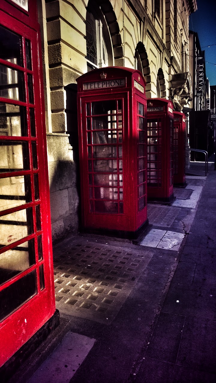 Telephone Boxes: Red Payphones All In A Line. All In A Line