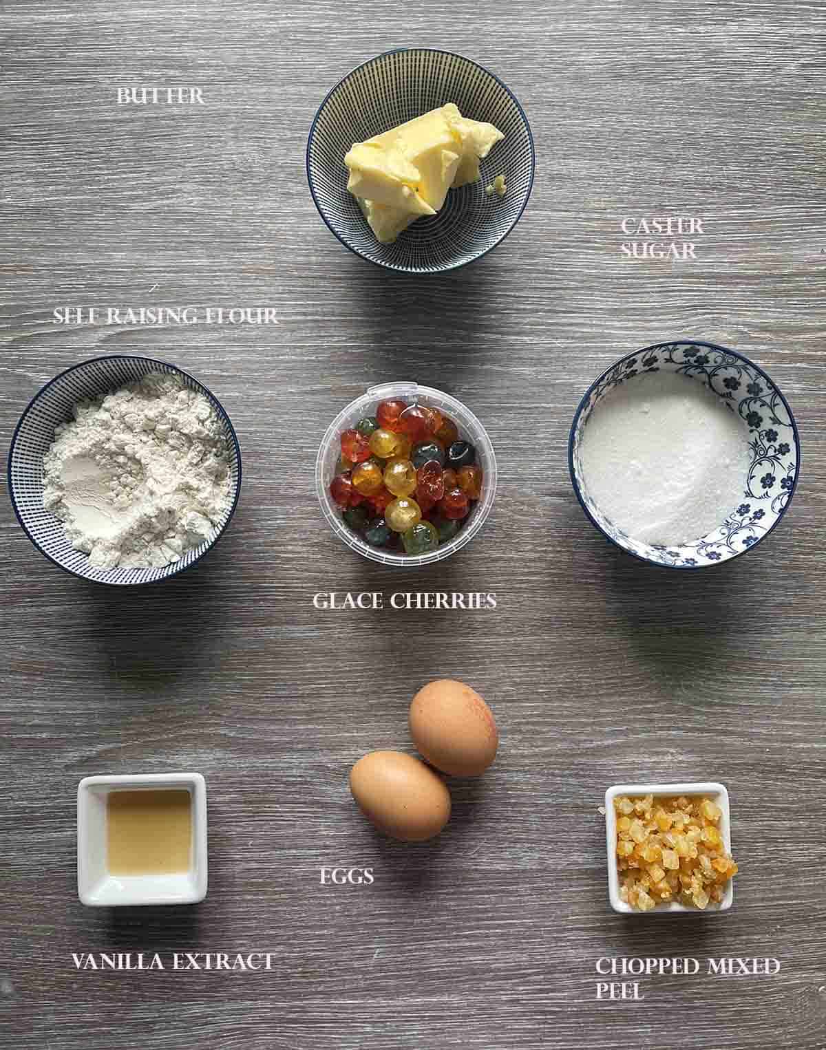 ingredients including glace cherries, flour, sugar, butter and eggs.