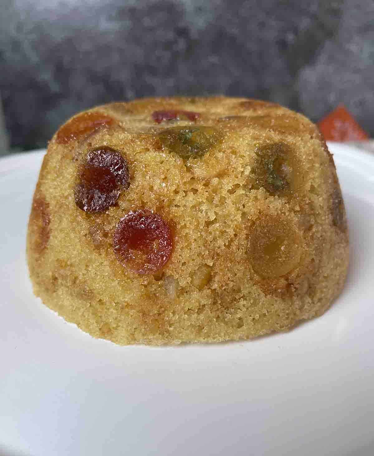 Cabinet pudding on a white plate.
