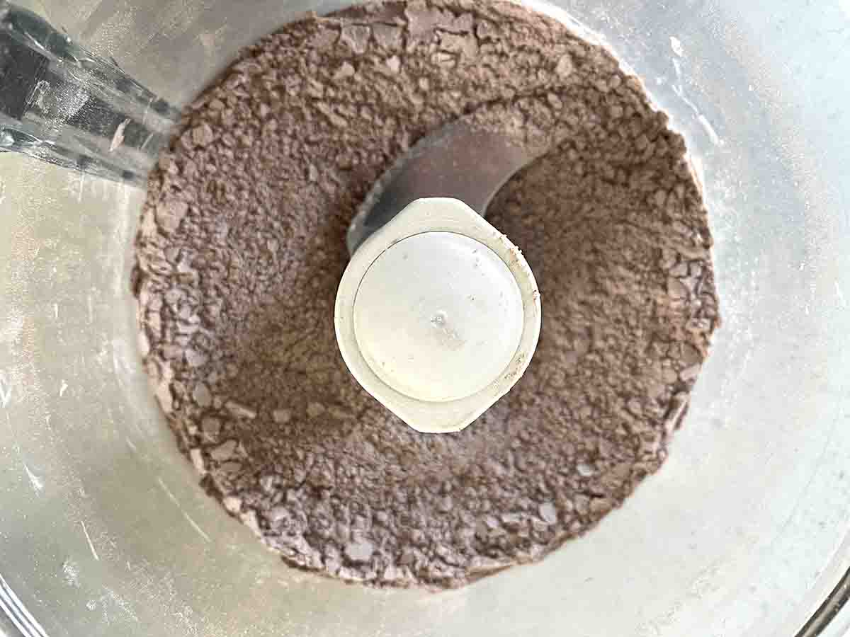 flpour and butter in a food processor.