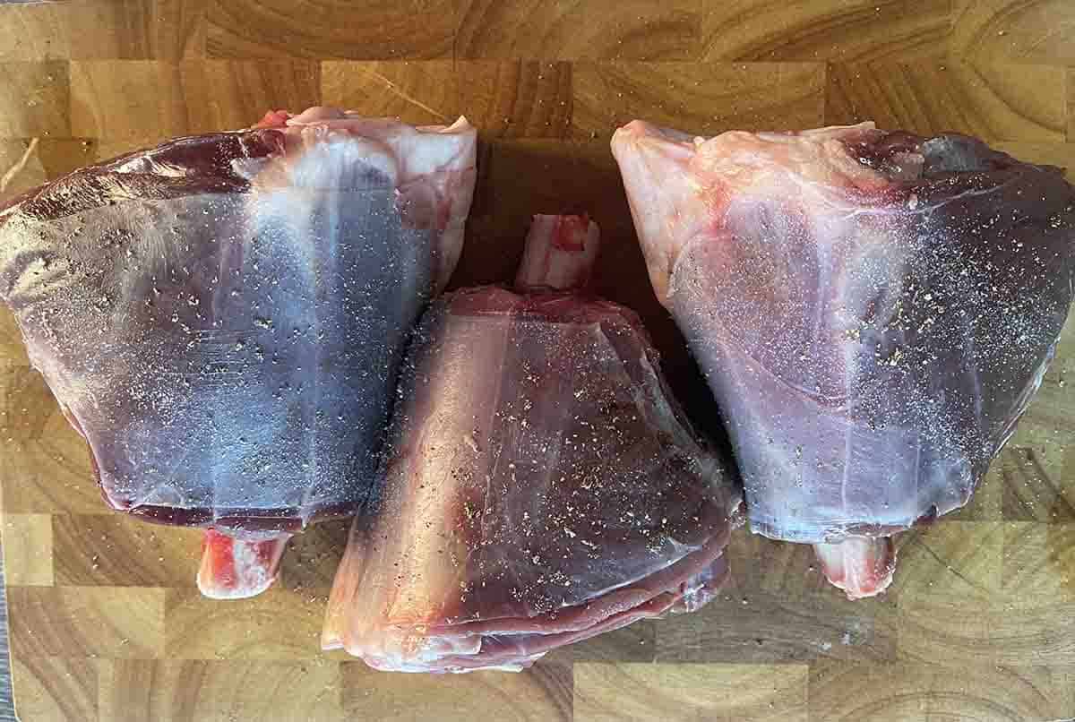 venison shanks on a board.
