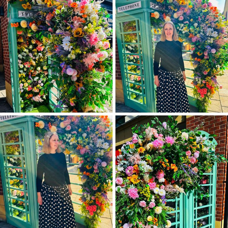 A Telephone Box Full Of Flowers And Styling A Polka Dot Skirt