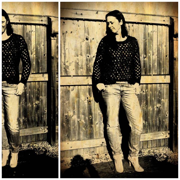 Black Jumper And Ripped Jeans