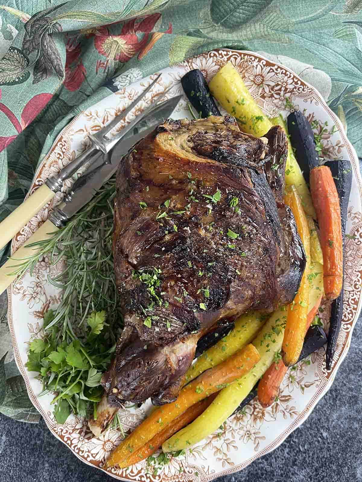 roast mutton on a serving plate.