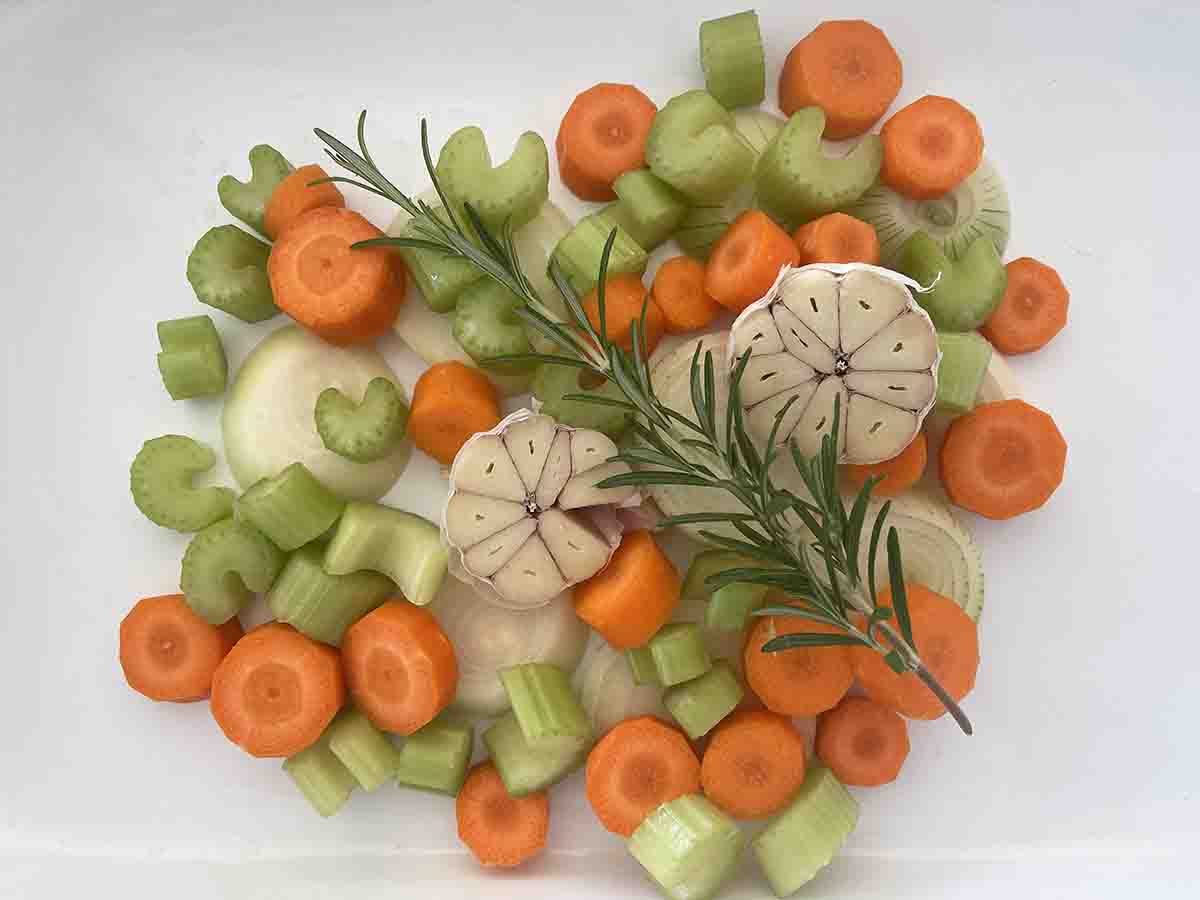 chopped vegetables in a roasting dish.