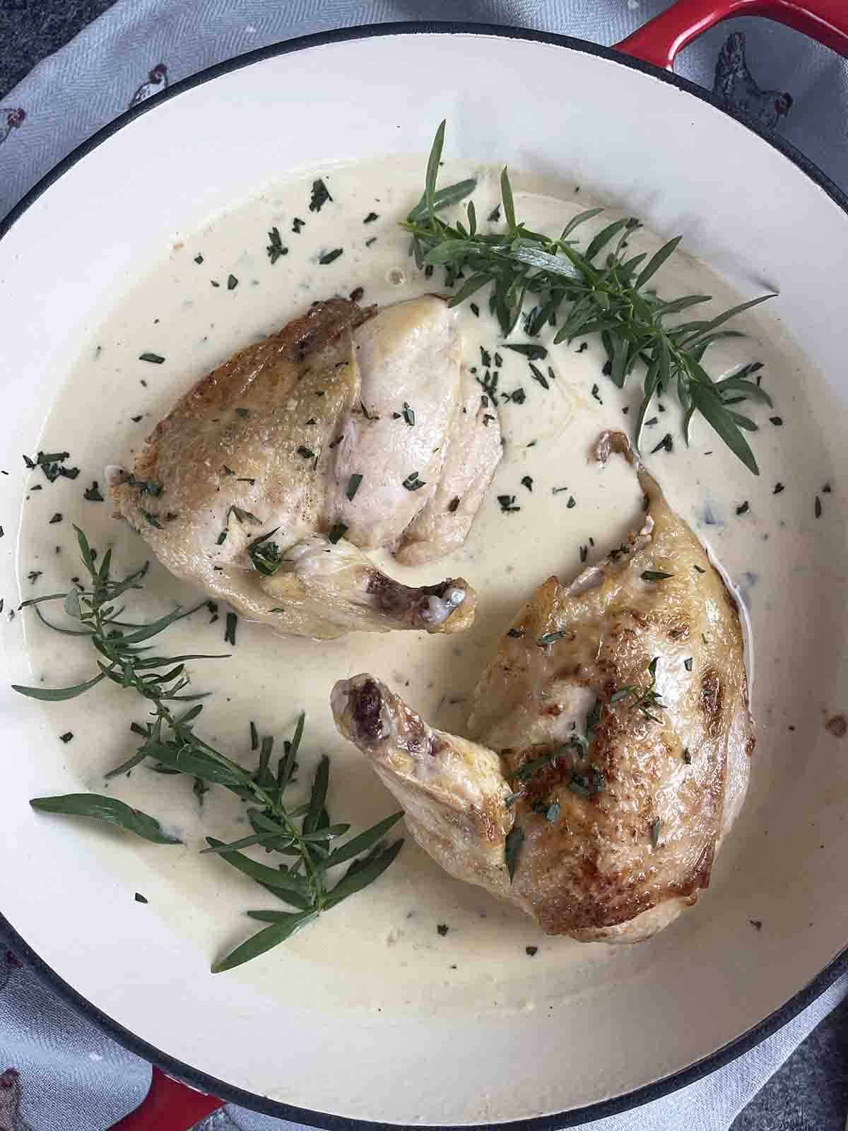 roast chicken supreme in a pan.