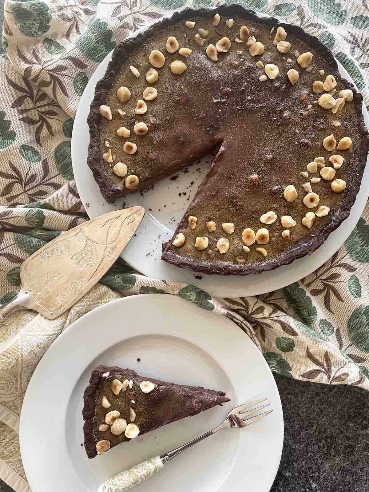 tart with slice cut out on a plate.