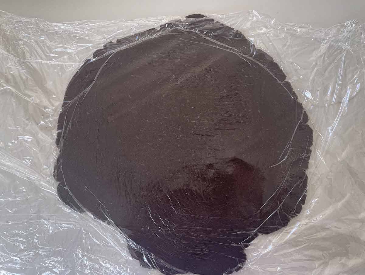 pastry rolled out between clingfilm.